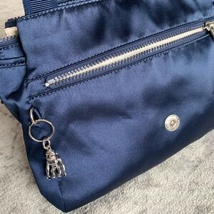 Elysia Kipling Navy Nylon/satiny purse with Silver Monkey Charm